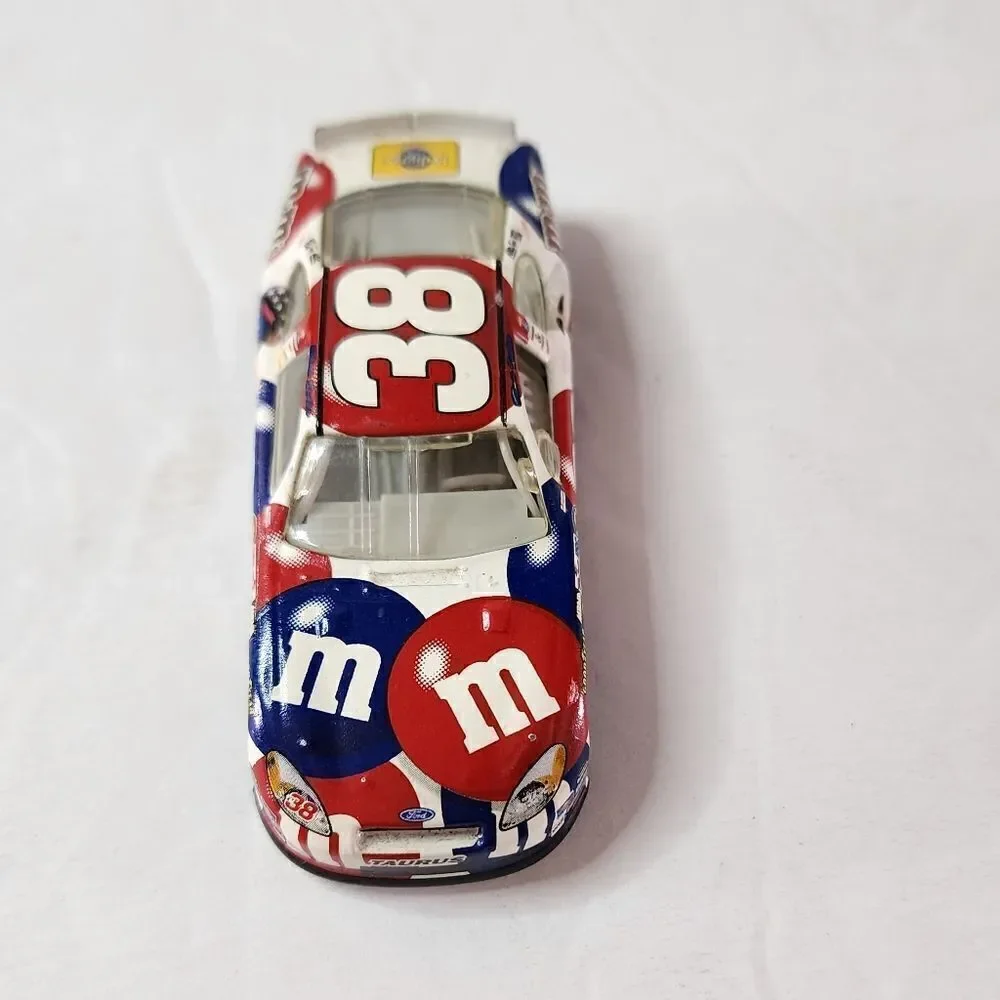 Action Elliott Sadler #38 M&M's 4th of July 2004 Taurus 1:64 Scale Nascar